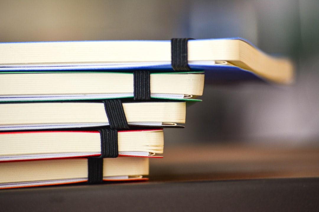 shallow-focus-photography-of-stack-of-book-uvdhvgaeem4